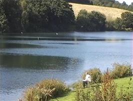 A fisherman at Hawkridge Reservoir, Aisholt, 30.2 miles into the ride